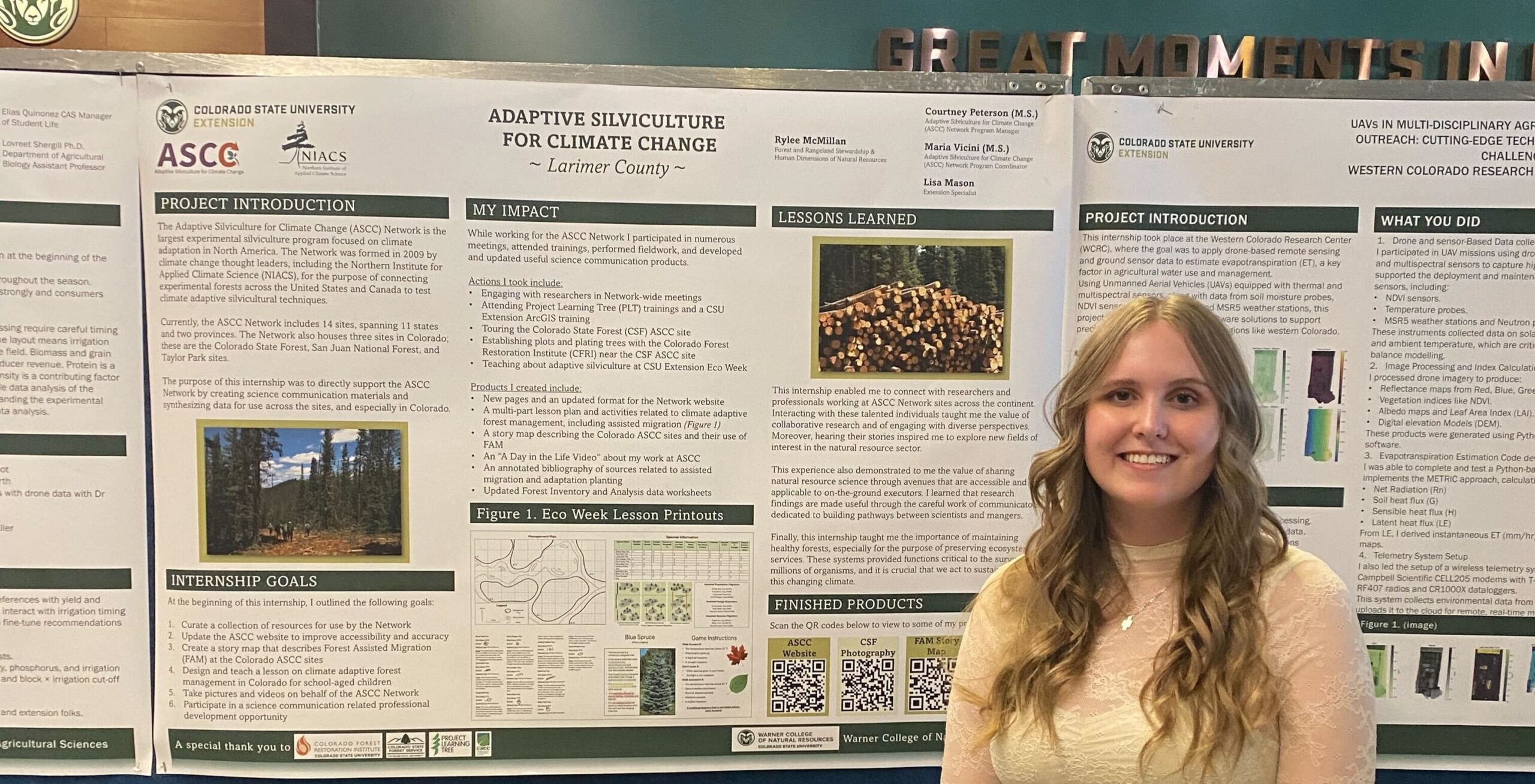 Rylee standing in front of her extension internship poster.
